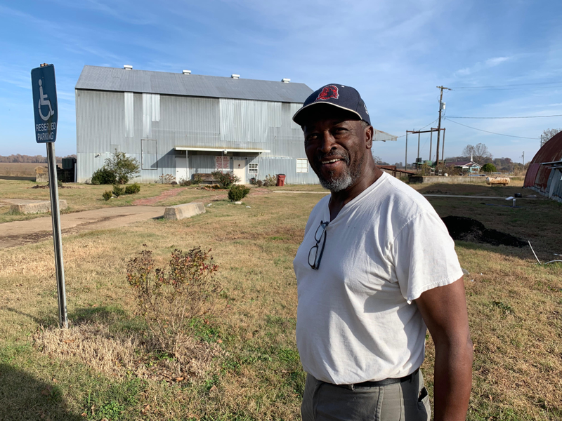 Johnny B. Thomas, who runs the Emmett Till Museam in Glendora, standing in front of the main building on November 24, 2018